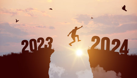Welcome Merry Christmas and Happy New Year in 2024. Black silhouette man jumping from 2023 cliff to 2024 cliff with cloudy sky and sunlight. vector illustrationのイラスト素材