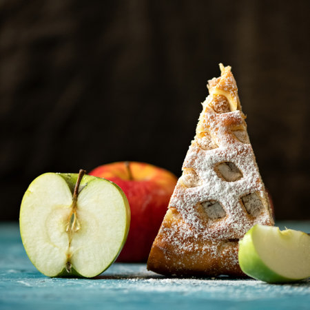 Apple slices and pie of cake for light rustic snack. Copy space for text at the top of the picture. Square format 1x1. Template for internet publications.の写真素材
