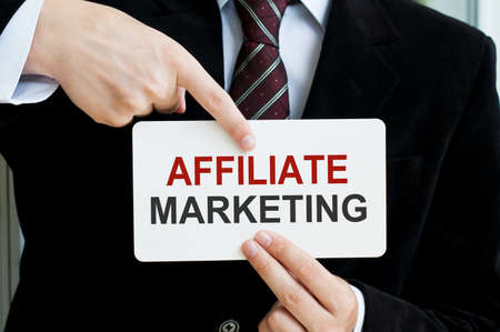 Affiliate Marketing Card In Male Hands. Business Concept