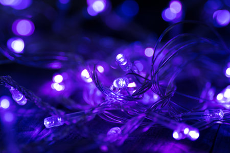 Christmas garland in purple color. Selective focus.の写真素材