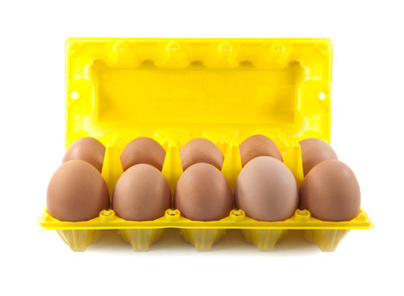 Isolate eggs in the package on a white backgroundの写真素材