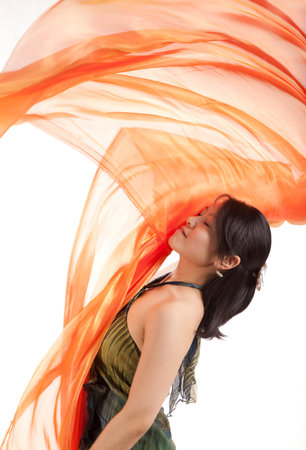 A beautiful girl with an orange handkerchief transparentの写真素材