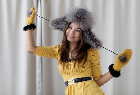 A girl in a fur hatの写真素材