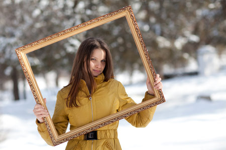 Portrait of a beautiful girl in the winter. Winter girl.の写真素材