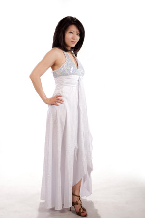 A girl in a dress on a white backgroundの写真素材