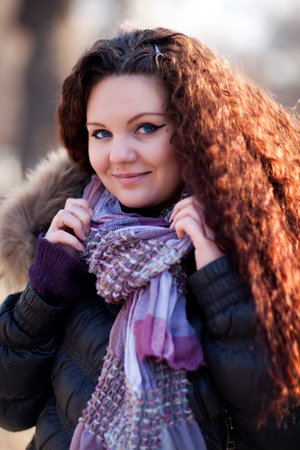 Outdoor portrait of young pretty beautiful womanの写真素材
