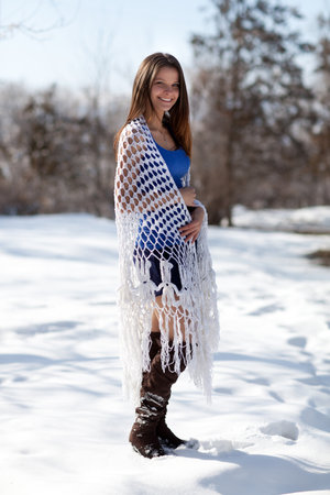 The girl in the sun for a knitted shawlの写真素材