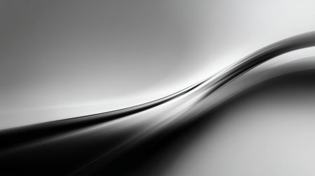 Luxury silver light motion abstract with smooth monochrome gradient and metallic tone.の素材