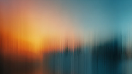 Sunset horizon motion blur abstract with orange and blue gradient tones.の素材