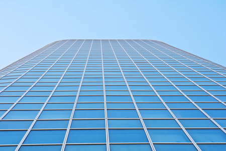 Detail of the facade an office building in the future against the blue sky