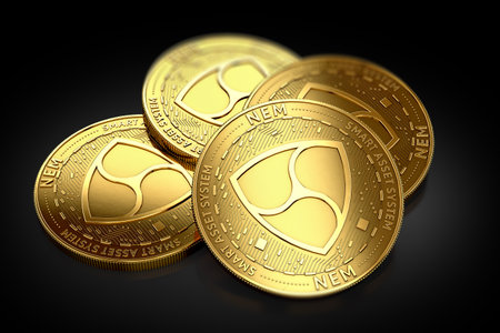 Stack of four golden NEM coins laying on the black background. 3D renderingの写真素材