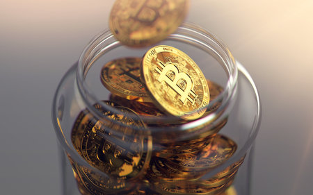 Golden Bitcoins in a jar. Storing cryptocurrencies concept. Realistic 3D renderingの写真素材