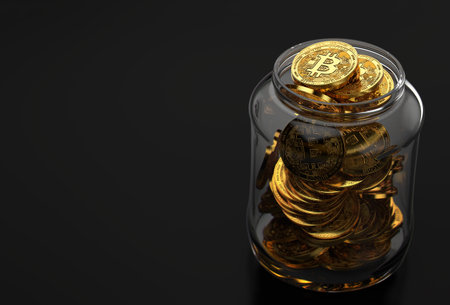 Jar full of golden Bitcoin coins isolated on black background with copy space on the left. Bitcoin Hold concept. Realistic 3D renderingの写真素材