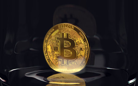 Golden bitcoin standing alone in a jar on black background. Cryptocurrency storage concept. 3D renderingの写真素材