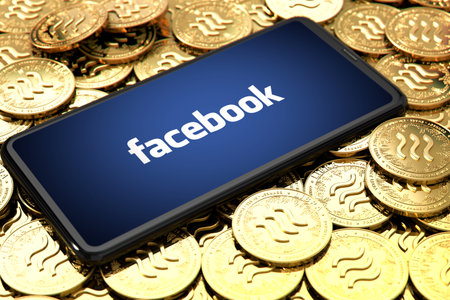 WROCLAW, POLAND - JUNE 20th, 2019: Facebook announces Libra cryptocurrency. Smartphone with facebook logo on the screen is laying down on Libra concept coins - 3D Illustrationのeditorial素材