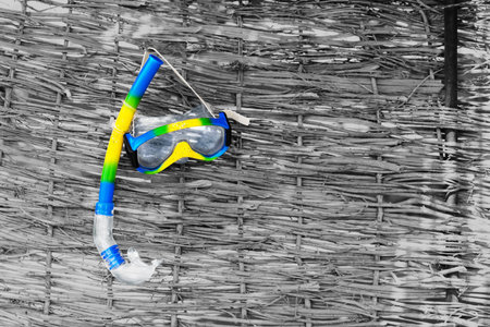 Beach accessories, fins, snorkel on wood backgroundの写真素材