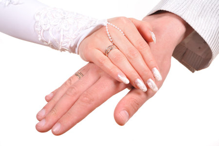 Bride and groom hands overの写真素材