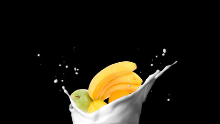 fruits in the milk splashの写真素材
