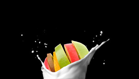 fruits in the milk splashの写真素材