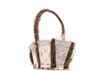 basket made from birch isolated on the white backgroundの写真素材