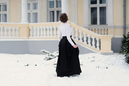 portrait of elegant woman outdoor in vintage styleの写真素材