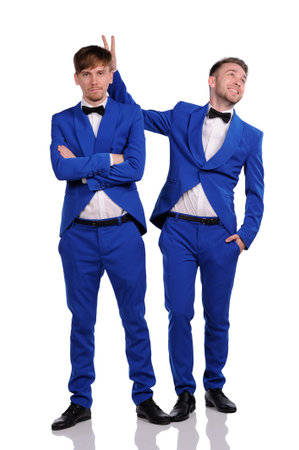 Funny men  dressed in blue suite with different emotionsの写真素材