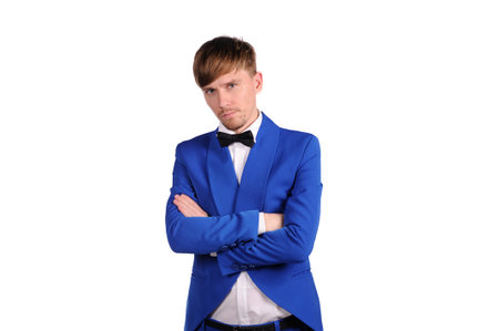 Serious man in blue suite with on white background の写真素材
