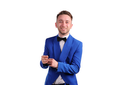 Smiling man in blue suite with on white background の写真素材
