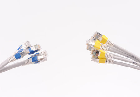 computer network cables over grey background 