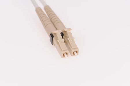 Fiber optic cables isolated on grey background