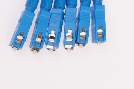 Fiber optic cables isolated on grey background