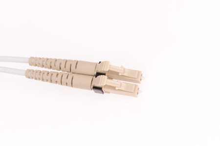 Fiber optic cables isolated on grey background