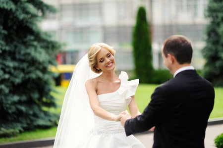 Happy bride and groom on their wedding dayの写真素材