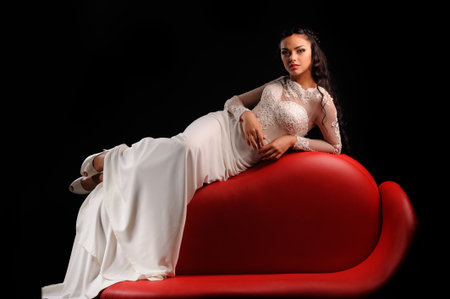 Portrait of Beautiful Sensual Woman in Fashion Black Dressの写真素材