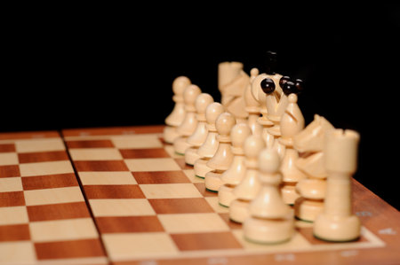 wooden chess pieces with chess desk