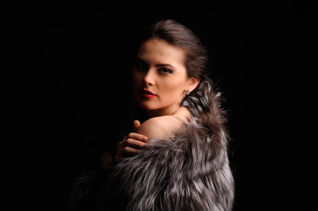 Beauty Fashion Model Girl in Blue Mink Fur Coat. Beautiful Luxury Winter Womanの写真素材