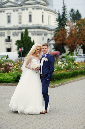 Happy bride and groom on their wedding dayの写真素材