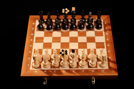 wooden chess pieces with chess desk
