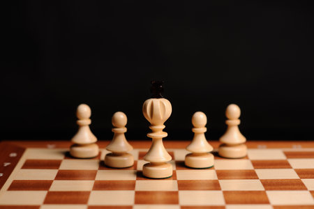 wooden chess pieces with chess desk
