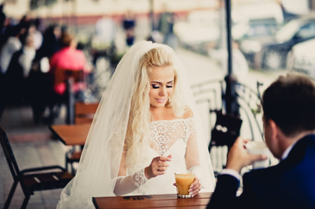 Happy bride and groom on their wedding dayの写真素材