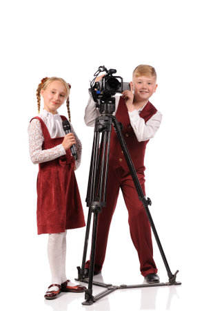 happy children with camera and microphone isolated over white backgroundの写真素材