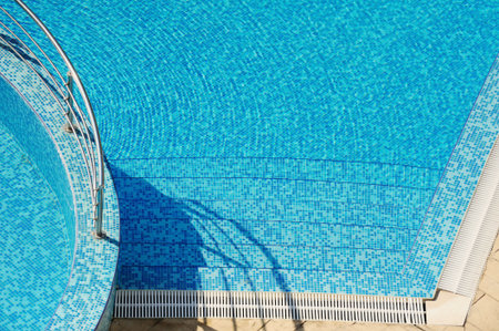 swimming pool with blue waterの写真素材