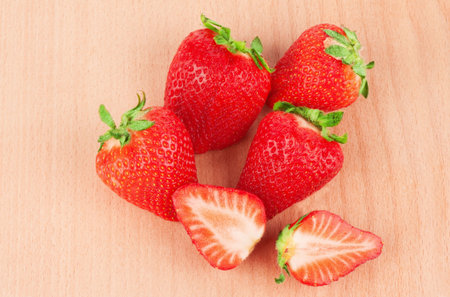 Strawberry on the wooden cutting boardの写真素材