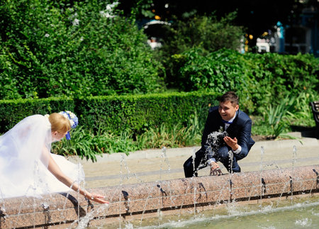 Happy bride and groom on their wedding dayの写真素材