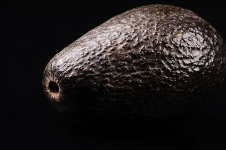 avocado over black background close-upの写真素材