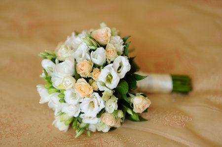 wedding bouguet of flowers on the floorの写真素材