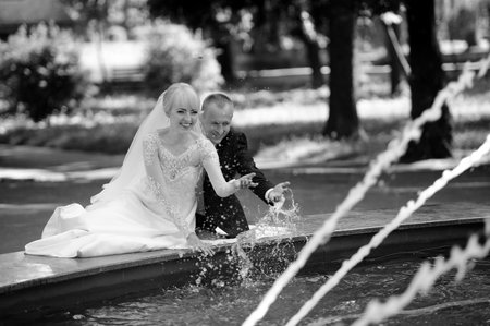 Happy bride and groom on their wedding dayの写真素材