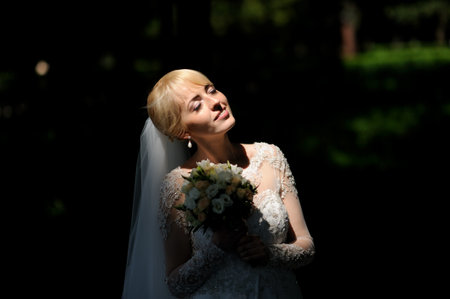 Beautiful portrait of the bride  outdoorの写真素材