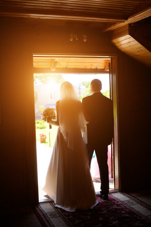 Bride and groom in the church after the wedding ceremonyの写真素材