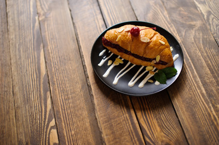 sweet croissant on the wooden tableの写真素材